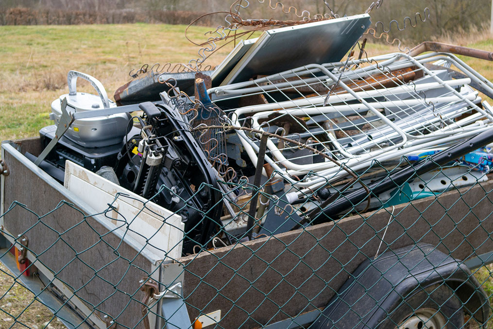 Trailer with scrap metal for the recycling center